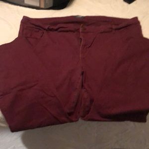 Maroon stretchy jeggings.